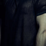 Detail of the short sleeve and textured black cotton mesh on the SYZMIC MESH T-SHIRT 213.