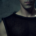 Front neckline detail of the black SYZMIC MESH TANK TOP 212 with rounded piping.