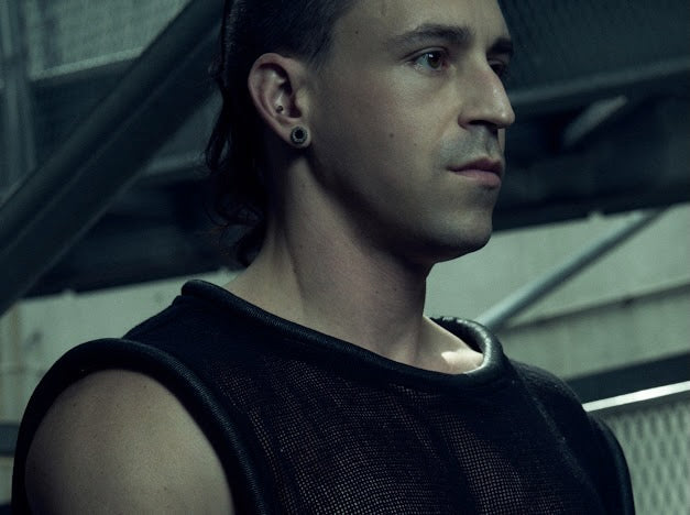 SYZMIC black MESH TANK TOP 212, three-quarter view showing its wide neckline and rounded piping.