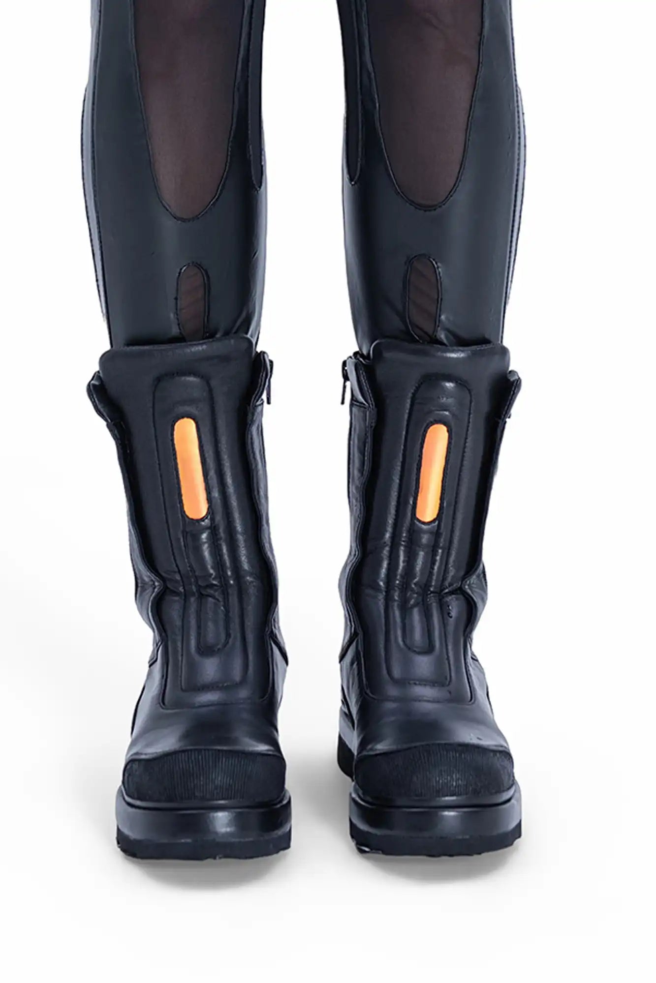 Close-up of Syzmic Studio EIDOS-701 boots in black leather with futuristic detailing, avant-garde cyberpunk techwear footwear.