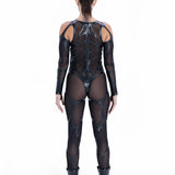Back of EIDOS-202 catsuit showing avant-garde biomorphic mesh panels and cyberpunk tailoring by Syzmic Studio.
