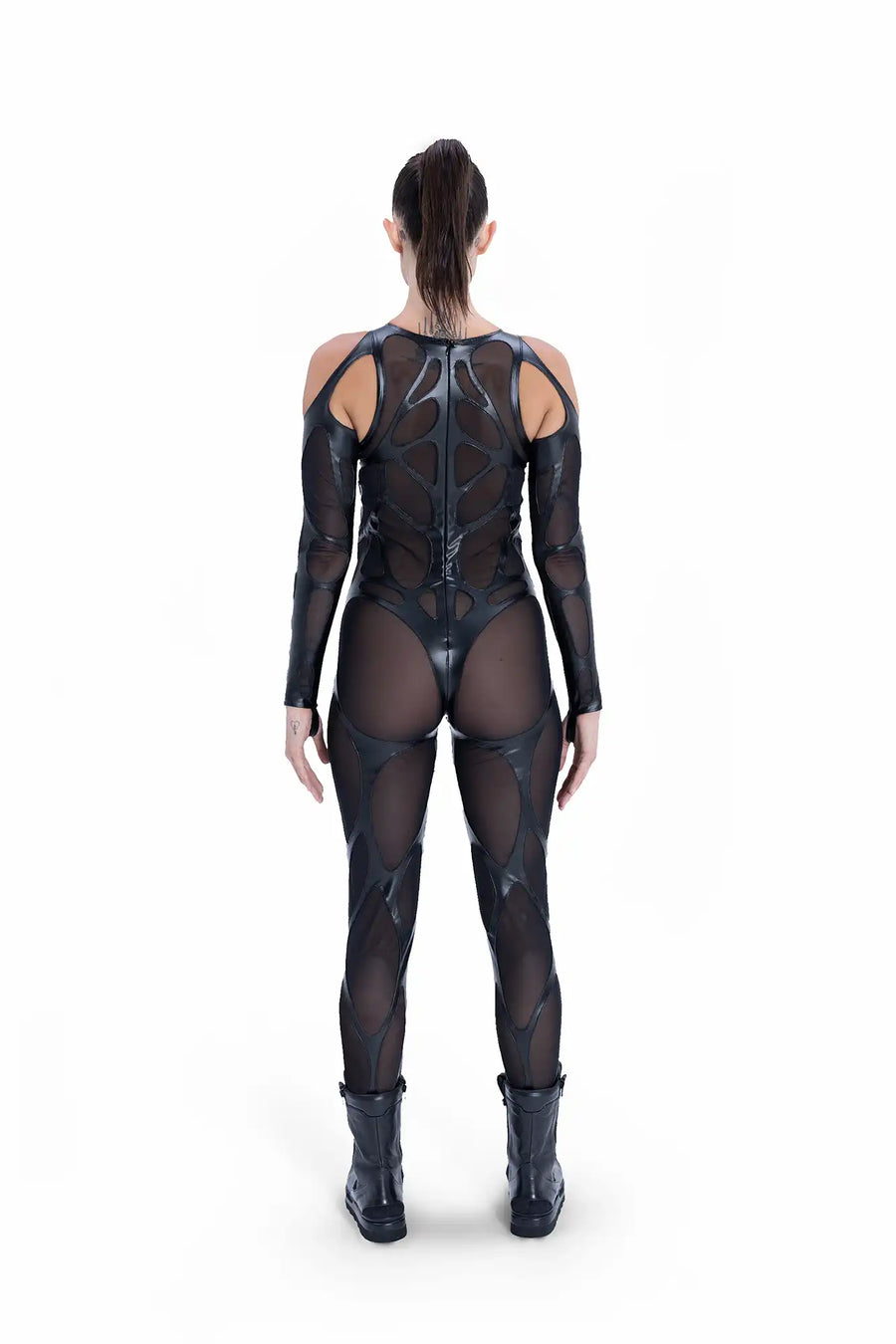Back of EIDOS-202 catsuit showing avant-garde biomorphic mesh panels and cyberpunk tailoring by Syzmic Studio.