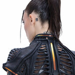 Back view of Syzmic Studio EIDOS-404 Exo-Jacket in black leather, featuring biomorphic cutouts and futuristic avant-garde design.