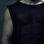 Close-up of the black EIDOS-212 tank top showing textured cotton mesh and tubular neckline.