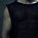 Close-up of the black EIDOS-212 tank top showing textured cotton mesh and tubular neckline.