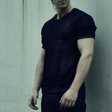 Front view of the black SYZMIC EIDOS-213 short-sleeve organic cotton mesh T-shirt.