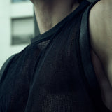 Black SYZMIC EIDOS-214 organic cotton mesh tank top photographed from below.