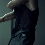 Black SYZMIC EIDOS-214 mesh tank top, side view showing the deep armhole.