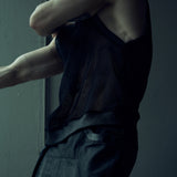 Black SYZMIC EIDOS-214 mesh tank top, side view showing the deep armhole.