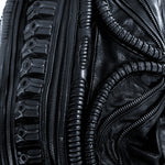 Avant-garde biomorphic backpack in dark post-apocalyptic fashion and leather handcrafted detail