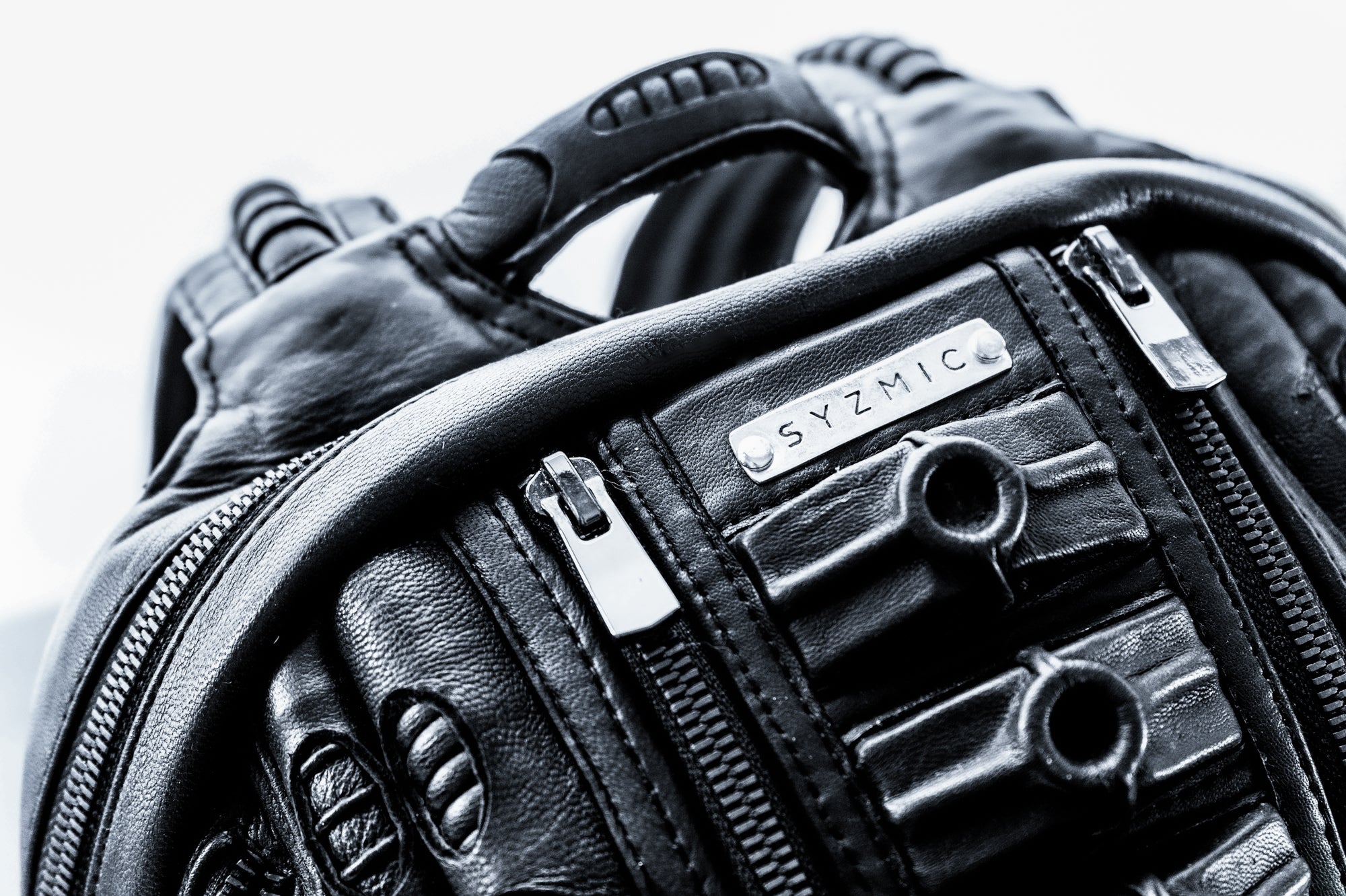 Avant-garde biomorphic backpack in dark post-apocalyptic fashion and leather handcrafted detail - syzmic studio