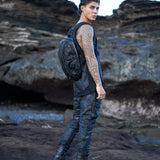Men's alternative apparel in post-apocalyptic fashion with leather alien backpack