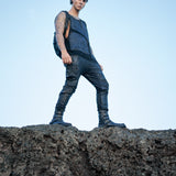 Men's post-apocalyptic, cyberpunk fashion with leather accessories and techwear clothing
