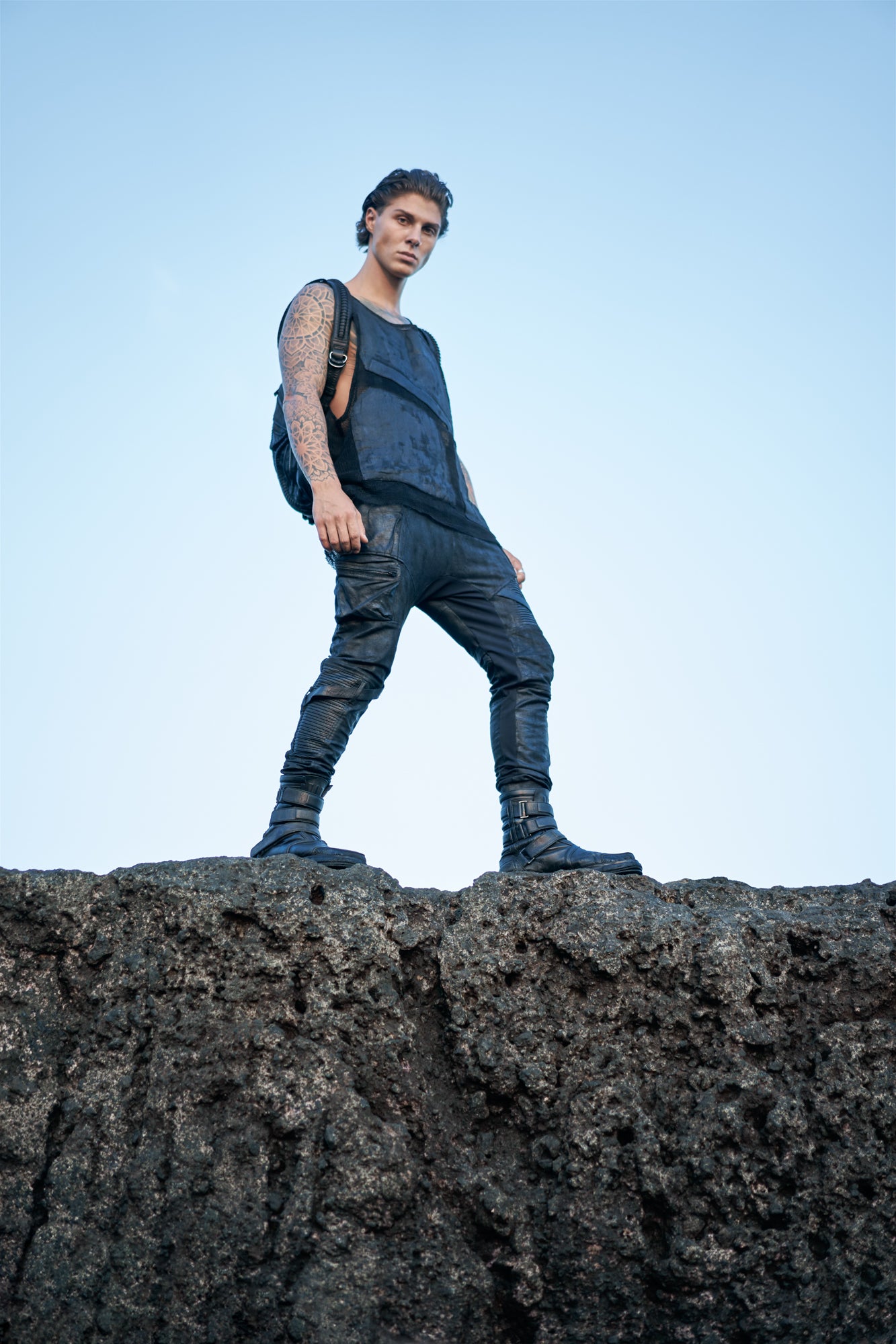 Men's post-apocalyptic, cyberpunk fashion with leather accessories and techwear clothing