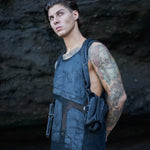 Dark post-apocalyptic apparel with leather holster bag and alternative mesh tank top