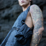 Avant-garde double pocket harness bag with exoskeleton claw magnet clasp