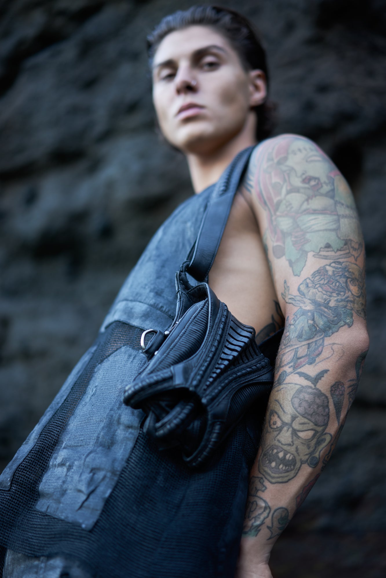 Avant-garde double pocket harness bag with exoskeleton claw magnet clasp