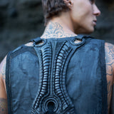 Unisex, avant-garde double pouch leather harness bag with biomorphic vertebral back panel & vein straps
