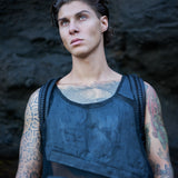 Men's post-apocalyptic mesh tank top with leather avant-garde backpack straps