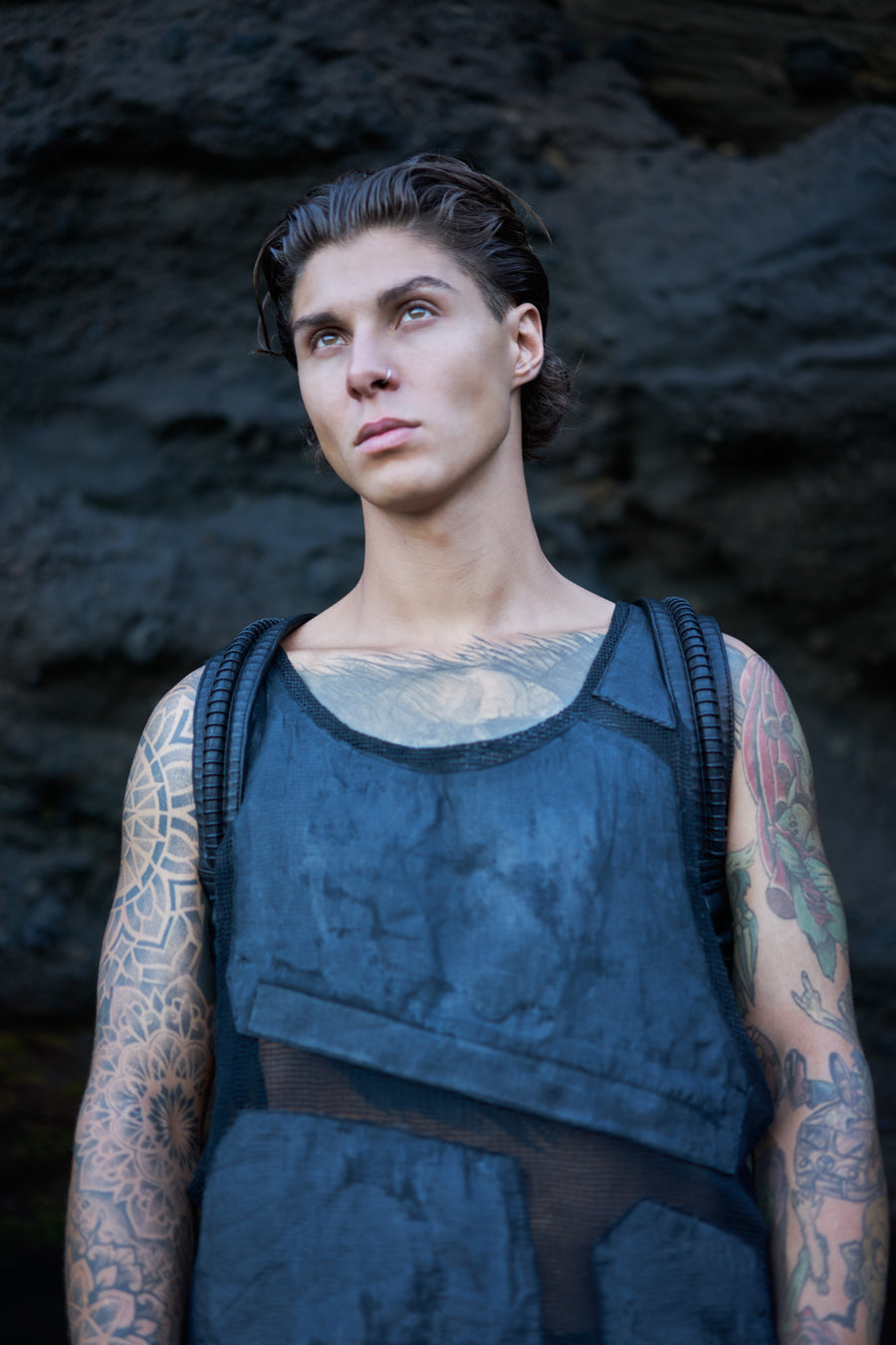 Men's post-apocalyptic mesh tank top with leather avant-garde backpack straps