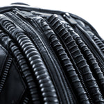 Handcrafted unique sci-fi leather goods with avant-garde, alien xenomorph, biomorphic design