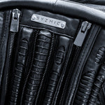 Handcrafted leather bags with biomorphic alien design aesthetic