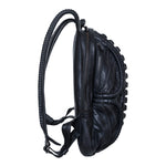 Avant-garde leather laptop backpack with biomorphic spine design in dark post-apocalyptic fashion