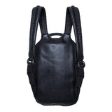 Avant-garde backpack in dark post-apocalyptic fashion and leather biomorphic straps