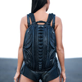 Women's avant-garde streetwear with dark post-apocalyptic clothing and alien futuristic giger leather backpack