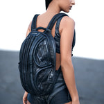 Women's avant-garde laptop backpack with post-apocalyptic clothing