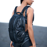 Women's avant-garde laptop backpack with post-apocalyptic clothing